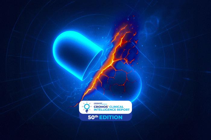 Blue glowing pill splitting with electric crack, symbolizing disruption in pharma – Cromos Clinical Intelligence Report 50th Edition.